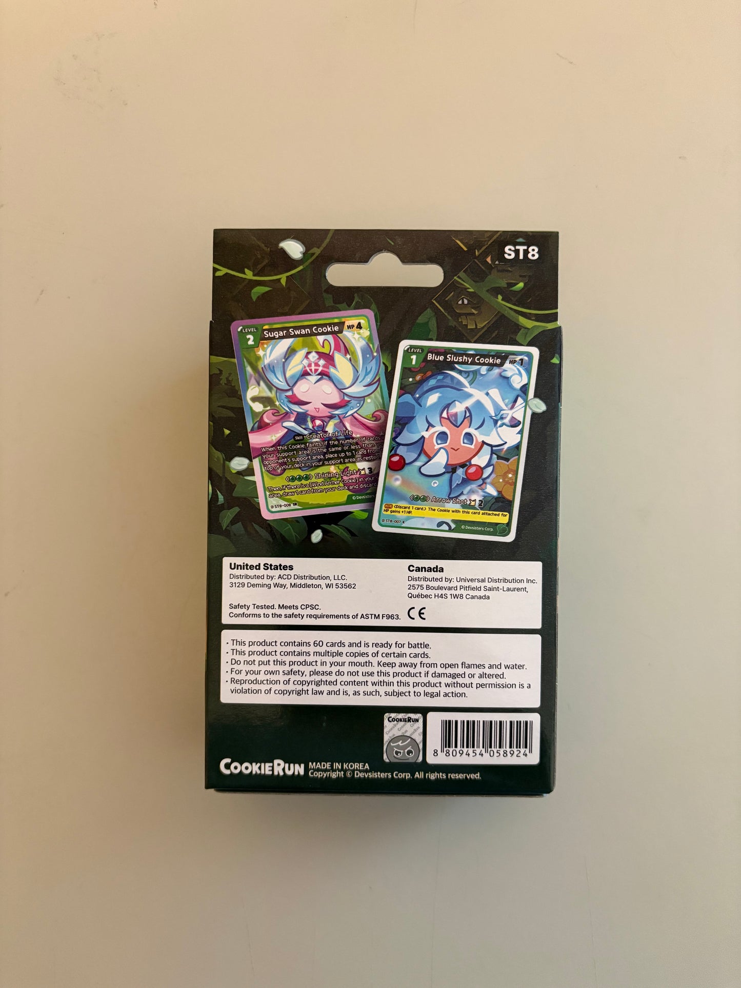 Back of CookieRun Braverse TCG Legendary Cookie Starter Deck Green Guardian Winds featuring characters and themes from the CookieRun universe.